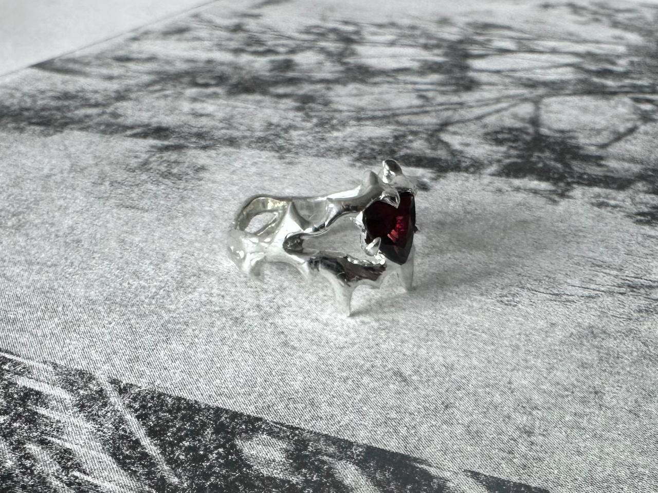SP garnet ring